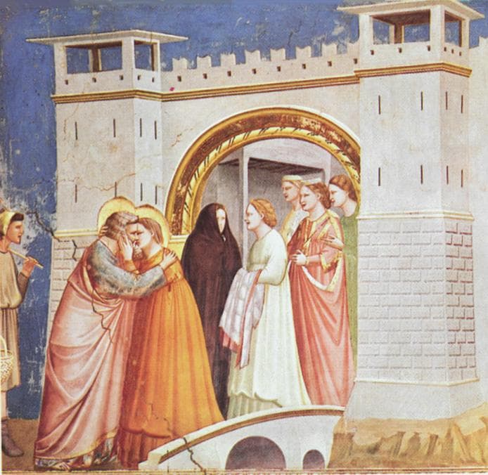 Joachim and Anna embrace before a gateway, with a shepherd to the left and a group of women standing behind them.