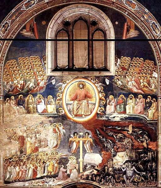 Christ sits within a radiant oval at the center of a chapel wall, surrounded by angels, saints, the blessed, and scenes of punishment.
