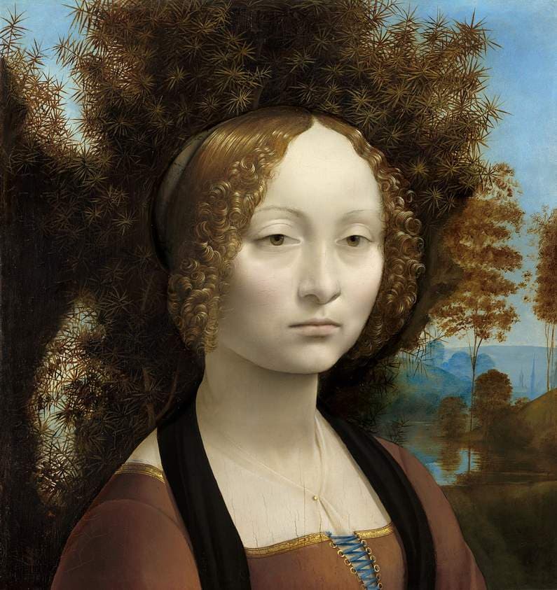 A young woman with curled hair faces the viewer before a dark juniper bush, with water and distant trees to the right.