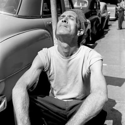 New York (Man Sunning on Street) — Vivian Maier